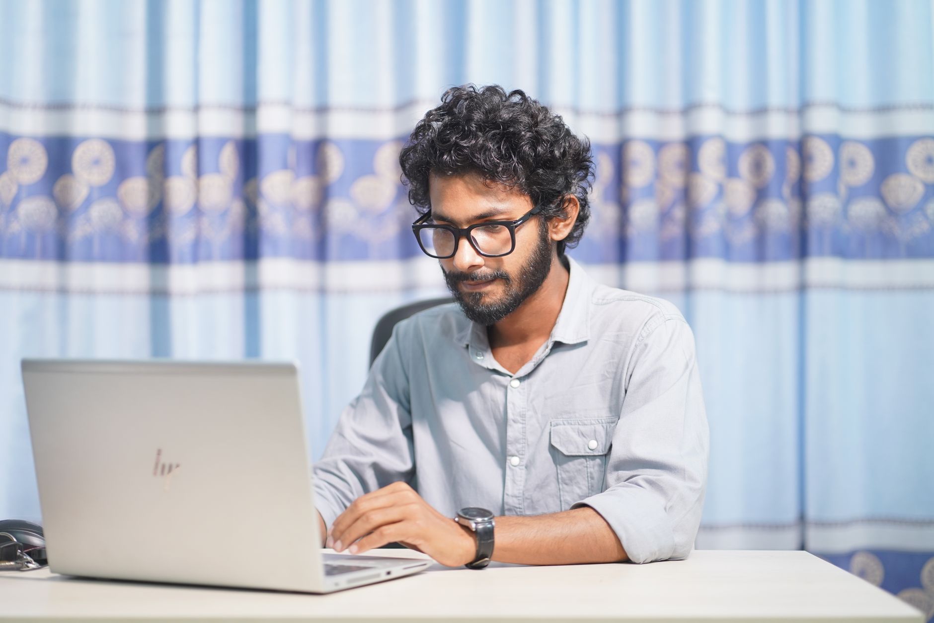 A developer building a small business website on a laptop